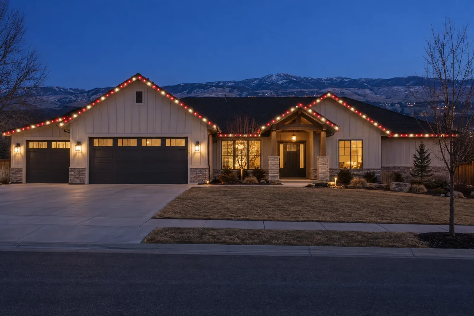 A single-story with alternating red and warm white bulbs, the foothills behind